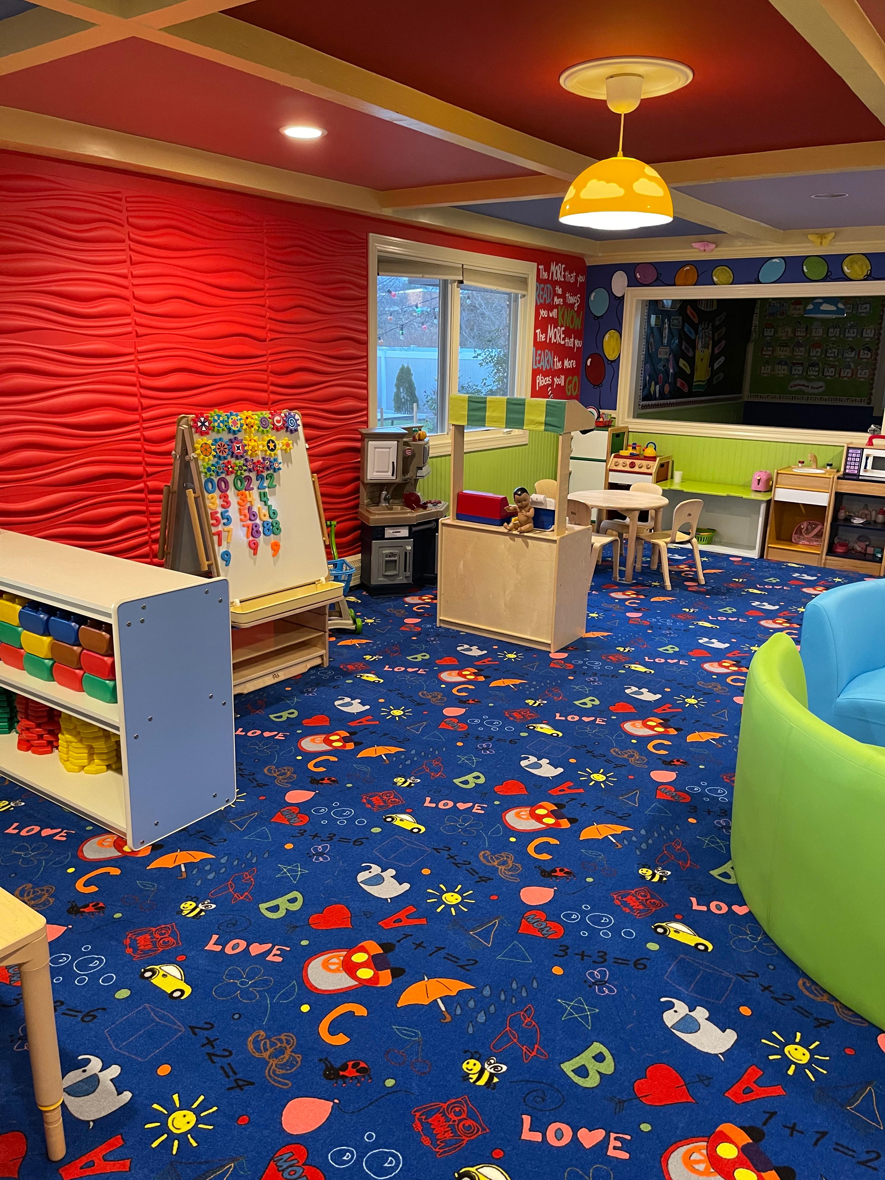 Learning center with magnetic number board and blocks storage